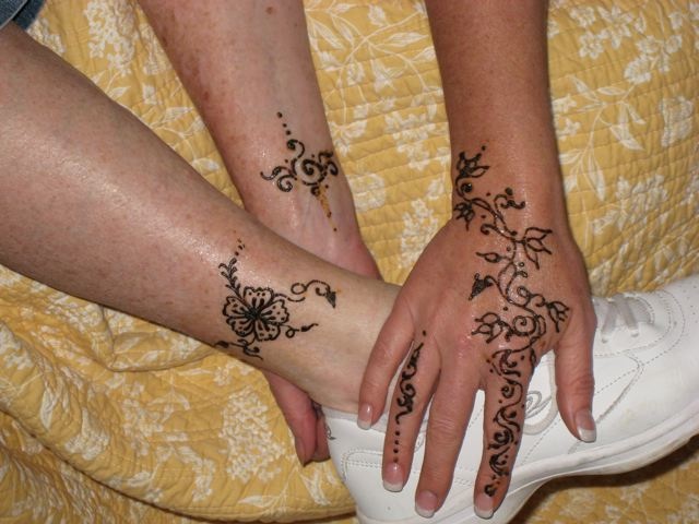 “henna tattoos” (mehndi).